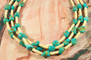 Beautiful 3 strand Necklace featuring Genuine Sleeping Beauty Turquoise and Melon Shell Heishi. Sterling Silver Beads, Cones and Clasp. Created by Santo Domingo Artist Carol Pacheco. The Santo Domingo Pueblo is in New Mexico, near Santa Fe.
